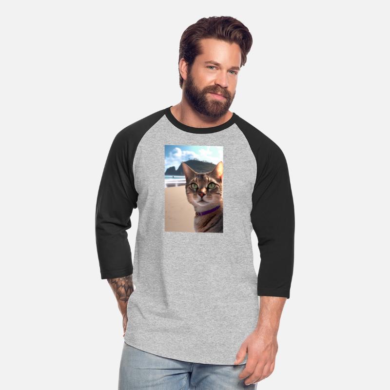 Tabby cat with purple collar at the beach